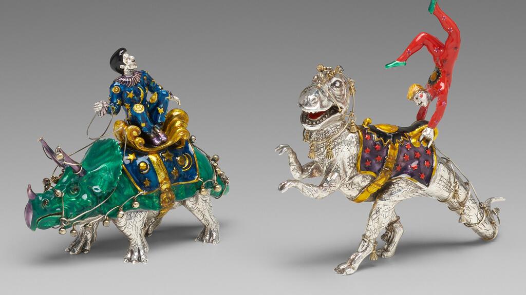 Gene Moore was known for his whimsical creations, like these figurines of acrobats on top of a Tyrannosaurus rex and a Triceratops. This pair sold for $16,250, more than double the high-end of its $6,000 to $8,000 estimate. 20220210_1-Gene Moore.jpg